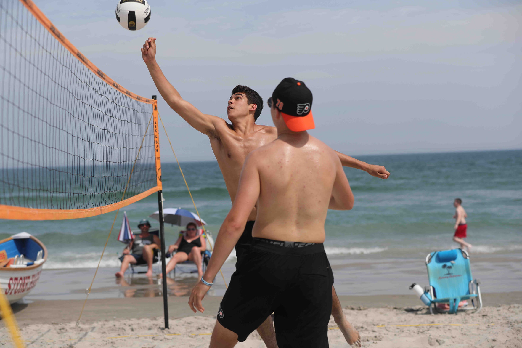 Philadelphia Flyers prospects sign autographs and play volleyball